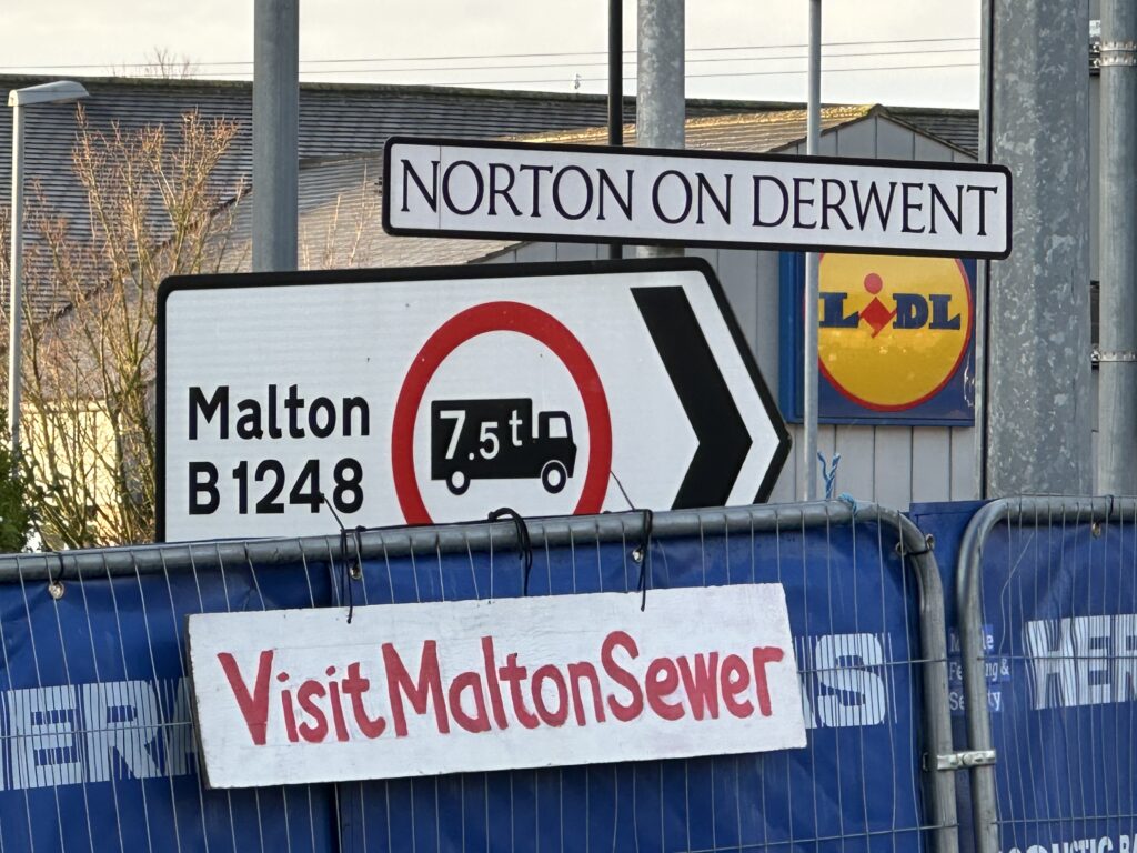 Norton level crossing - River Derwent, Norton, Malton sewage pollution. 